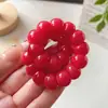 Pulseira Bodhi Cor de Rosa em Formato de Dente de Alho Cortado Redondo com Intestino de Porco para Estudantes, Brinquedo para Torcer os Dedos Alivia o Estresse, Atacado