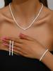 Conjunto de tres o cuatro piezas: collar, pendientes y pulsera con cadena de garras que combinan con todo, de alta gama, estilo nicho de moda.