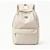 Mochila nueva 2026, ligera, de gran capacidad y elegante para estudiantes de secundaria y preparatoria, diseñada para reducir la carga de los estudiantes universitarios y adecuada para mujeres