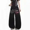 Estrella del estilo urbano americano y pantalones casuales elásticos de pierna ancha largos para hombre y mujer, con estampado de letras, corte holgado para baile y deportes