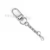 Venta al por mayor del fabricante Pestillo de puerta de aleación de zinc Hebilla de gancho de cadena de cuatro secciones Accesorios para muñecas Accesorios de ferretería para llaveros