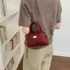 Bolsa de mão feminina estilo Chanel com padrão de losangos 2026 nova tendência primavera verão bolsa de mão tipo bola de boliche para trabalho deslocamento bolsa de ombro único transversal