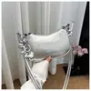 Bolso pequeño plateado de alta gama a la moda para mujer, nuevo modelo 2026, bolso de axila de nicho de lujo ligero, bolso cruzado exquisito de verano