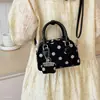 Nuevo bolso de mano cruzado de moda para mujer, exquisito, de ante, para ir al trabajo, otoño 2026, de un solo hombro, con estampado de lunares de bola de boliche