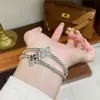 Moda Retro Francesa Exquisito Temperamento Versátil Doble Cara Micro-Incustrado Circonita Pulsera de Trébol de Cuatro Hojas Lujo Ligero Joyería de Alta Gama