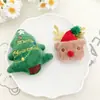 Accesorios de bricolaje navideño: Adornos de peluche de Santa Claus y renos, pinzas para el cabello, broches, decoraciones para zapatos y calcetines, y adornos para empaques