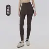 Pantalones de yoga de dos piezas de imitación para mujer con bolsillos de cintura alta, adecuados para usar al aire libre, falda-pantalón deportiva, entrenamiento de Pilates, pantalones de fitness anti-exposición