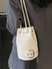 2025 Nueva Moda Coreana Cuero de Cera de Aceite Simple Personalidad Bolso Cubo Moderno Versátil para Viajes Diarios Color Sólido Bolso Cruzado para Mujeres