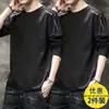 Temporada de primavera y otoño, camiseta lisa de manga larga popular, corte holgado, cuello redondo, camiseta interior para hombre, top simple y versátil