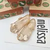 Nuevos Zapatos de Gel Melissa 2025 Sandalias Infantiles Sandalias Boca de Pez con Lazo Zapatos de Playa para Niñas Zapatos Fragantes