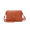 Bolsa Feminina 2025 Nova Primavera e Verão Jovem Cor Sólida Casual Versátil Bolsa Feminina Tecida Ombro Transversal Bolsa Pequena Tecida