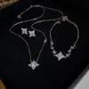 Collar con Colgante de Estrella de Cuatro Puntas de Circonita Accesorios Diseño de Nicho para Mujer Cadena para Clavícula de Moda Versátil Collar de Lujo Ligero de Gama Alta