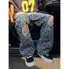 Jeans de Mezclilla Lavada Desgastada Rasgados con Estampado de Estrellas Sueltos Sentido del Diseño Marca de Moda Hip Hop Americano Pantalones Rectos Micro Acampanados
