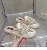 Zapatillas de Baotou de Tacón Bajo para Mujer 2026 Otoño Nuevas Versátiles Moda Perla Punta Redonda Fisherman Slip-on Planas Zapatos Individuales