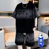 Conjunto masculino moderno de manga curta para adolescentes, casual de verão, plus size, modelagem solta, versátil, conjunto de camiseta esportiva e shorts