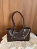 2026 Nova Bolsa Simples de Jeans Lavado de Grande Capacidade Bolsa de Ombro Vintage Desgastada com Rebites Bolsa de Ombro para o Trabalho