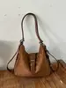 Bolsa de Ombro Única Grande Capacidade Versátil Outono/Inverno Nova para Mulheres Fashion 2026 Tendência Temperamento Transversal Dupla Ombro Casual Simples