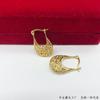 Estilo lujo ligero chapado en oro cobre forma de bolsa hueca moda versátil elegante simple sentido de diseño cortesano celebridad de internet hebilla de oreja