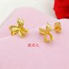 Venta al por mayor de aretes dorados de latón para mujer, joyería de imitación de oro, actividades de venta directa de fábrica, regalos, aretes de flor de varios estilos