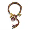 Cuerda de mano de Xizang bermellón thangka ocho santos protectores puxian guanyin thangka pulsera tejida a mano cuerda de mano de la reencarnación