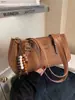 Bolso Retro de Gama Alta Coreano para Mujer 2025 Nueva Moda Bolso Versátil de Axila para el Trabajo y los Viajes Bolso Hombro Baguette