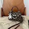 Bolso cuadrado pequeño de lunares para mujer, nuevo bolso cruzado versátil de moda estilo coreano para el verano 2026, bolso de hombro simple para el día a día