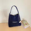 Bolsa Feminina Nova Moda Transfronteiriça 2026 Bolsa de Ombro Tendência Estilo Ins Bolsa Tote de Lona Grande Capacidade Casual