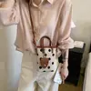Bolso de teléfono de lunares moderno y elegante 2026 nuevo bolso de mano casual simple para el día a día bolso cruzado tipo cubo fresco y fresco