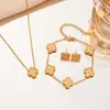 Conjunto Colar Trevo de Quatro Folhas de Aço Titânio que Não Desbota Dupla Face para Mulheres, Fashion, Elegante, Luxo Leve, Sensação de Alta Qualidade, Pulseira de Nicho Atacado