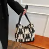 La bolsa popular de este año 2023 nueva moda en línea popular bolsa tote para mujer gran capacidad Bolso de hombro de lona para mujer
