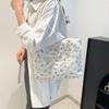 Bolsa de ombro estilo ocidental floral de palha da moda, nova bolsa casual simples para primavera, bolsa tote versátil, bolsa de viagem moderna para mulheres