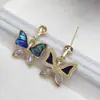 Pendientes de perlas DIY hechos a mano transfronterizos para mujer, postes de pendientes vacíos, pendientes de mariposa de concha de abulón natural al por mayor