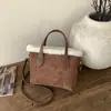 Cross2026 Otoño Invierno Nuevo Versátil para el Trabajo Bolso Cubo de Mano para Mujer Nicho Gama Alta Retro Bolso de Hombro Cruzado