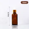 Botellas dispensadoras de esencia cosmética líquida portátiles al por mayor del fabricante, Botellas vacías, Botellas gotero de vidrio ámbar transparente para aceites esenciales