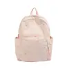 Nueva mochila escolar de estilo japonés ins fresca y de alta moda para niñas, mochila con diseño de color caramelo, bolsa ligera de doble hombro para estudiantes de secundaria y preparatoria