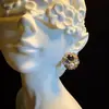 Brincos Roxos Vintage com Design Floral