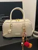 Otoño 2026 Nuevo Color Sólido Personalizado Elegante Bolso Almohada de Mano Alto Valor Nicho Retro Textura Tejida Bolso Cruzado