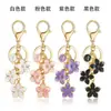 Aliexpress Comercio Exterior Nuevo Producto Llavero Colgante Flor Rosa Colgante de 26 Letras Colgante para Bolso Llave de Coche
