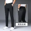 Calças Casuais de Seda Gelada de Hong Kong para Homens, Novas Calças Afuniladas Slim-Fit de Primavera e Outono, Calças Sociais Tendência Estilo Coreano de Alta Elasticidade