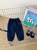 Pantalones de Primavera para Niños 2025 Estilo Coreano Bordado de Carita Sonriente Pantalones Casuales para Bebés Niños Más Fáciles de Combinar Pantalones Waffle de Pierna Delgada