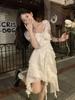 Vestido Blanco de Princesa de Manga Corta Estilo Francés para Pausa del Té 2025 Verano Nuevo Estilo Volantes Falda Corta Irregular Cintura Ajustada para Petite