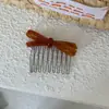 Peine para el Cabello con Forma de Moño de Mariposa de Acetato Peine Insertado en la Parte Posterior Pinza para el Flequillo 2026 Nuevo Peine de Celebridad de Internet Antideslizante Calavera Alta Pinza Lateral para el Cabello Esponjoso