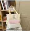Nueva Bolsa de Tutoría de Estilo Japonés de Alto Valor Estilo Universitario Fresca Dulce Linda Dibujos Animados Cuadros para Niñas Bolso Cruzado Ligero