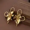 Brincos de Metal com Flor Tridimensional de Círculo Geométrico Brincos Longos Florais Banhados a Ouro Brincos Femininos para Férias na Praia Europeias e Americanas
