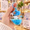Cachorrinho Branco Azul Flutuando em Óleo, Miniatura de Cachorro Pequeno, Chaveiro de Garrafa com Areia Líquida, Pingente de Boneco Cartoon Fofo