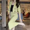 Elegante y moderno traje de mujer para primavera y otoño, blazer de color liso con botones y corte ajustado, falda elegante que se ajusta a la cadera, conjunto de dos piezas, transfronterizo