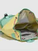 Mochila con cordón de bloques de color amarillo lima y menta, estilo montaña, vibra dopamínica juvenil, mochila ligera para viajes al aire libre