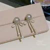 Pendientes de perla modernos y dulces, de lujo ligero con un toque de alta gama, pendientes de botón simples y exquisitos con pasadores de plata 925, pendientes de moda y con estilo para mujer