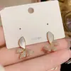 2023 Nuevo Estilo Mariposa de Circonita Microincrustada Zircón Plata Clavo de Oreja Moda Elegante Lujo Ligero Diseño de Alta Gama Pendientes
