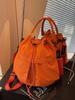 Bolso de Relajación Transfronterizo para Mujer 2025 Nuevo Bolso Bandolera de Hombro Versátil Popular Bolso Cubo Portátil Mochila